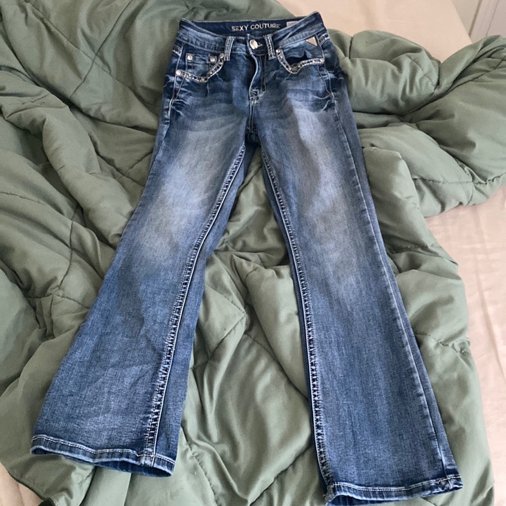sexy culture light wash bootcut with gems!